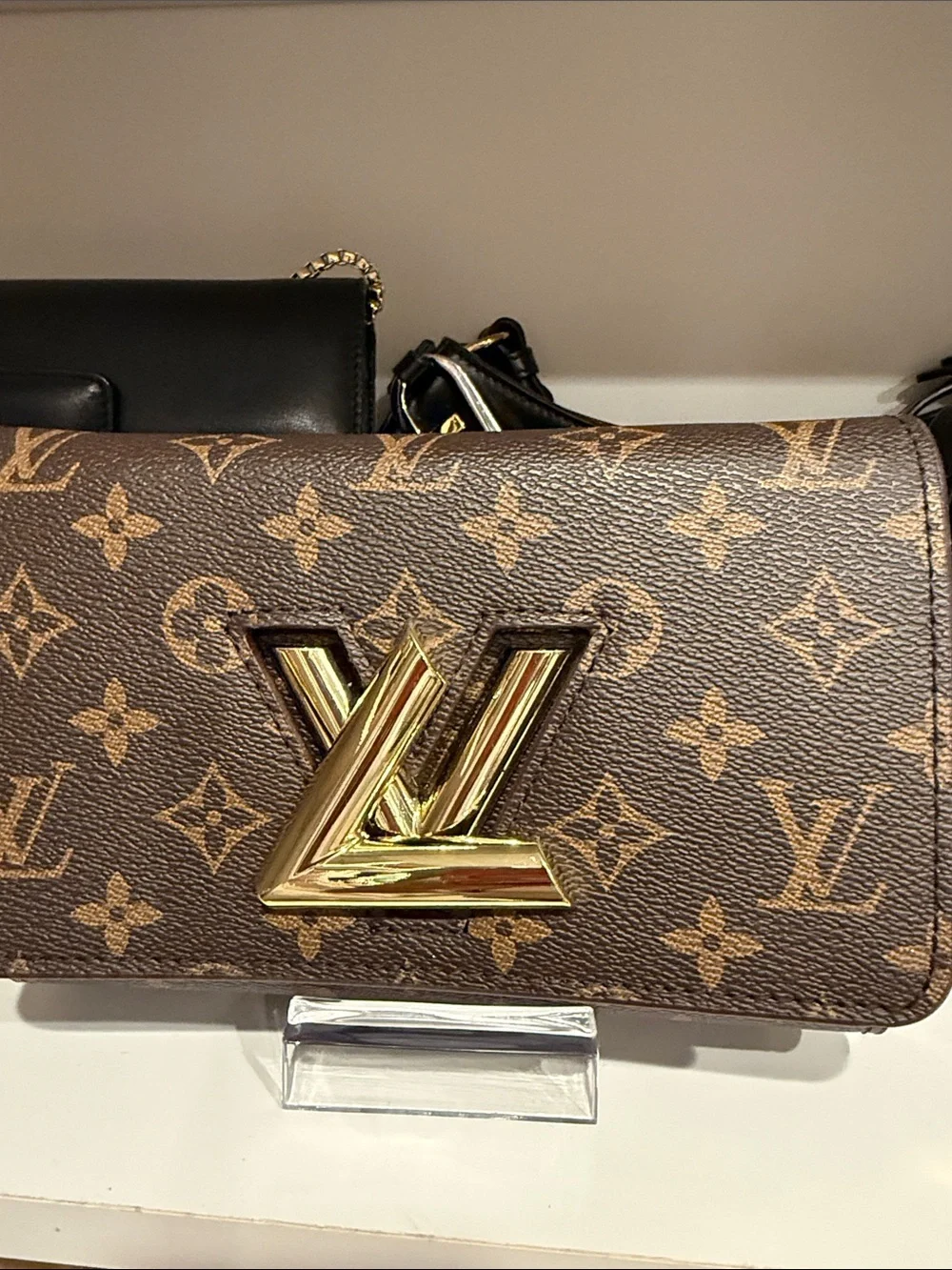 Louis Vuitton Brown Monogram Wallet purse with Gold LV Twist